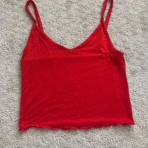 bright red tank top